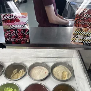 a display of different flavors of ice cream