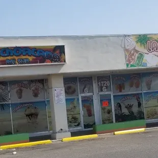 cars parked in front of the store