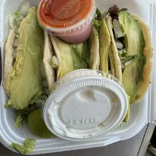 4 Carne Asada Tacos with Avocado and Crema.