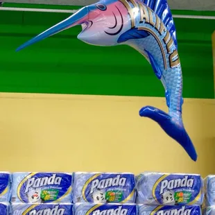 a blue marlin fish hanging from the ceiling