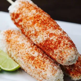 Elote (Corn on the stick)  Our corn is cooked fresh daily!