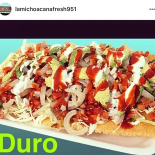 Come try the duro! It has cueritos, sour cream, lettuce, tomato, onion, Japanese peanuts, Valentina, chamoy, Tajín, lemon!