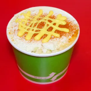 Esquite (Cut Corn) layered with Mayo, butter, cheese, and spice!