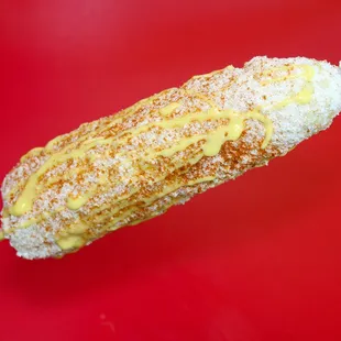 Corn on the cob layered with Mayo, cheese, butter, and spice!