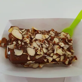 My delicious creamy strawberry, kiwi, mango pop dipped in chocolate &amp; almonds