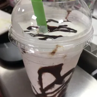 Vanilla milkshake with chocolate syrup