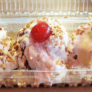 Churro Split. Think of it like a banana split, but it's all about the churros underneath .