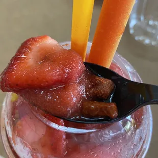 strawberries and a spoon