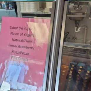 a sign in a deli