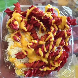 a bowl of chili cheese fries