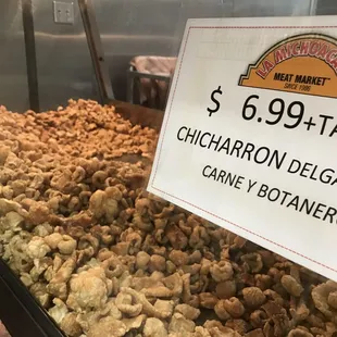 a sign for the charbon deli