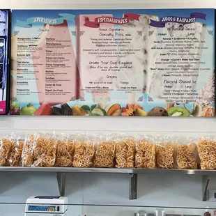 the menu and prices on the wall