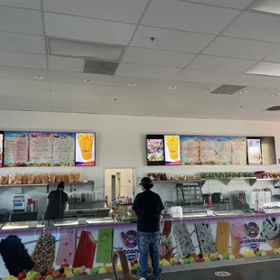 a man standing in front of a counter