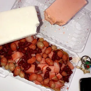 a container of strawberries and cheese