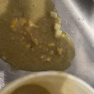 a pancake and a cup of coffee