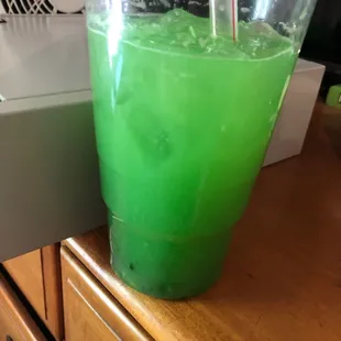 a green drink in a blender