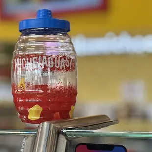  a drink in a glass jar