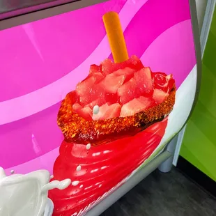 a strawberry ice cream sundae