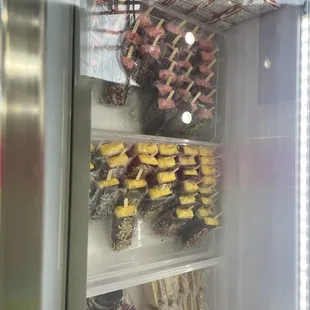 Their prepared chocolate dipped ice cream and fruit.