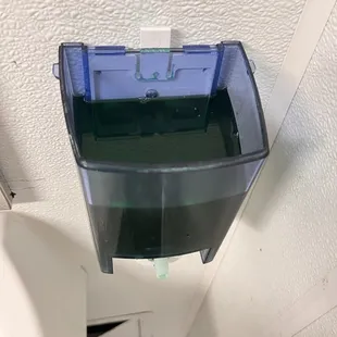 Ghetto hand soap dispenser. I don't know what happened to the lid. This is so unsanitary! The dispenser is broken.