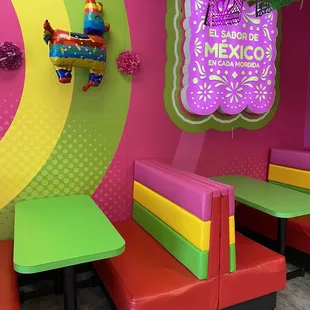 brightly colored booths