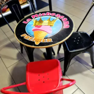 La Michoacana Premier! The trio seating with your elote buddy. Let's go!