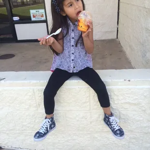 My little sister enjoying a Mangoneada :)