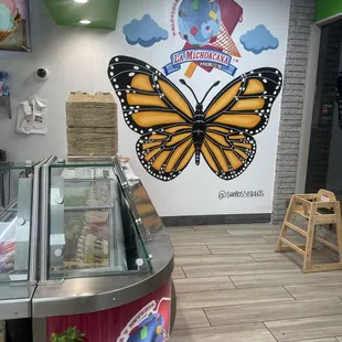 a butterfly painted on the wall