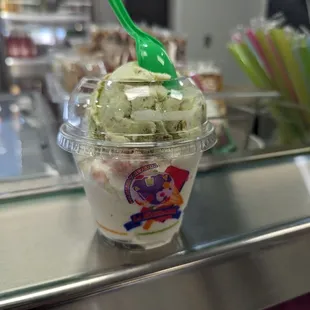 Scoop of queso and pistachio