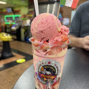 a strawberry ice cream sundae