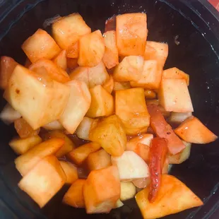 a bowl of diced fruit