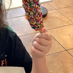 Frozen banana with sprinkles