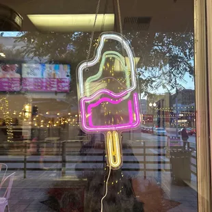 a neon ice cream sign