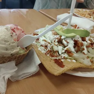 a plate of food with a scoop of ice cream