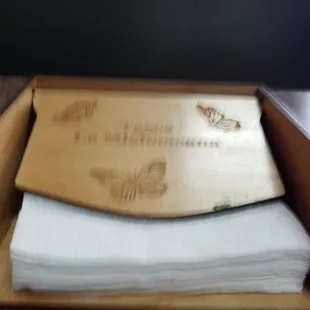 a close up of a wooden paddle