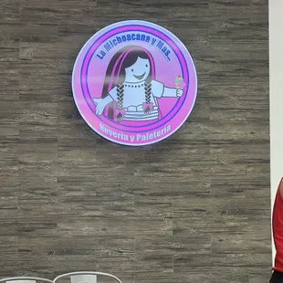 a woman standing in front of a restaurant