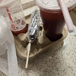 Jamaica With Strawberries and a Chocolate Covered Banana With Coconut Flakes. Delicious!