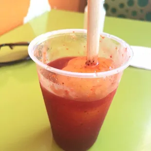 a drink in a plastic cup