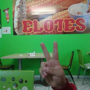 a person making a peace sign