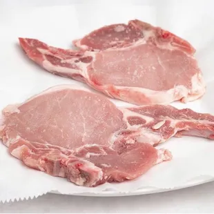 two pieces of meat on a plate