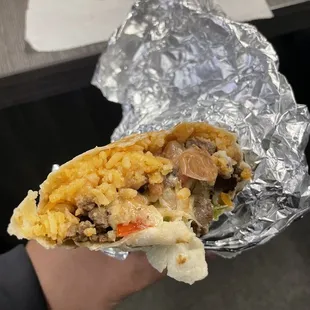 The tiny filling in a super burrito.
