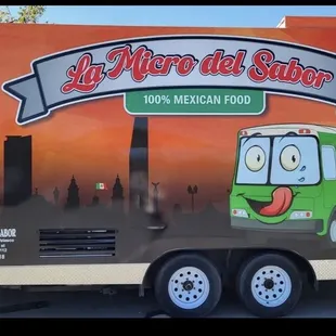 a food truck parked in front of a building