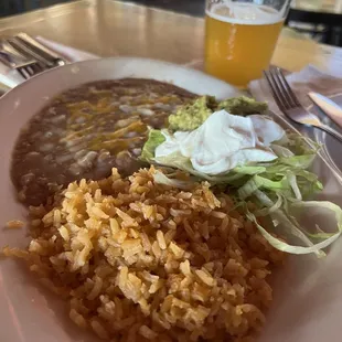 Rice and beans with guacamole and sour cream
