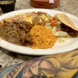 Poncho Villa combo. Taco &amp; carne guisada good flavor. Cheese enchilada.. lil bit bland red sauce compared to... well anywhere.