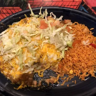 a plate of mexican food on a table