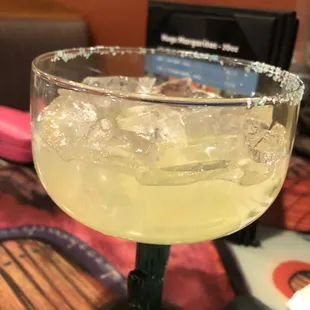 a margarita in a glass with ice