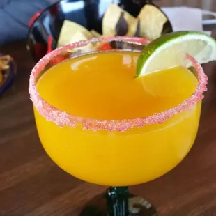 Mango margarita with sugar on the rim.