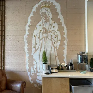 Cute. Religious or not. Def a pretty little mural