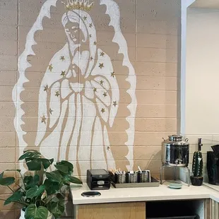 the virgin mary of guadalupe on the wall