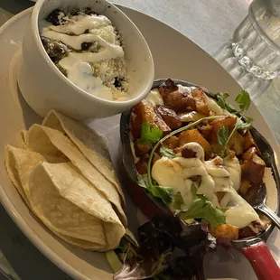 Queso Fundido with a twist! They subbed potatoes for chorizo because I'm vegetarian and it was great .